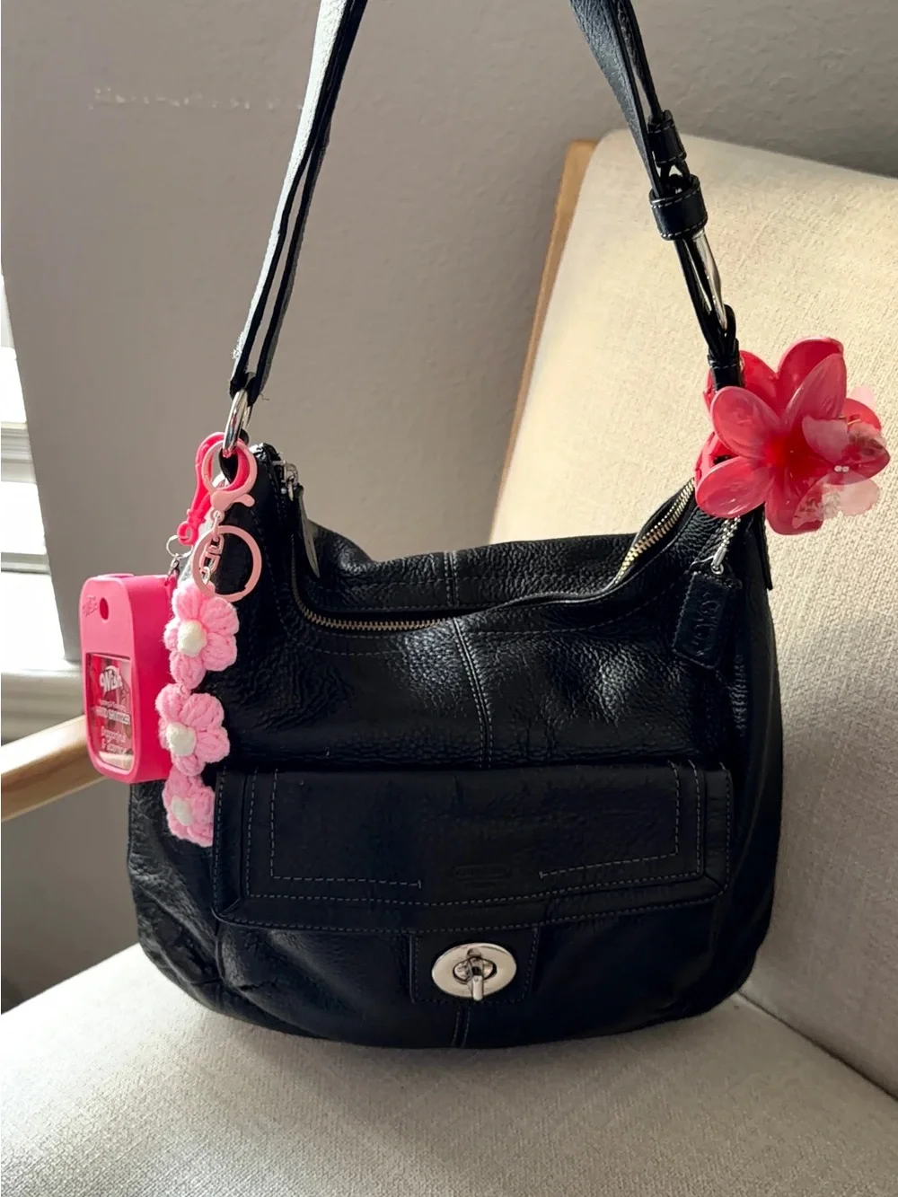 Coach Black Leather Shoulder Bag with Pink Floral Charms